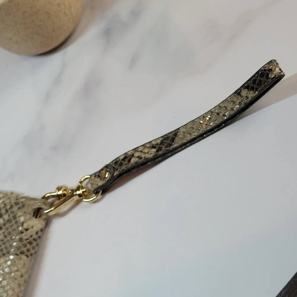 MICHAEL KORS SNAKE PRINT PHONE WRISTLET